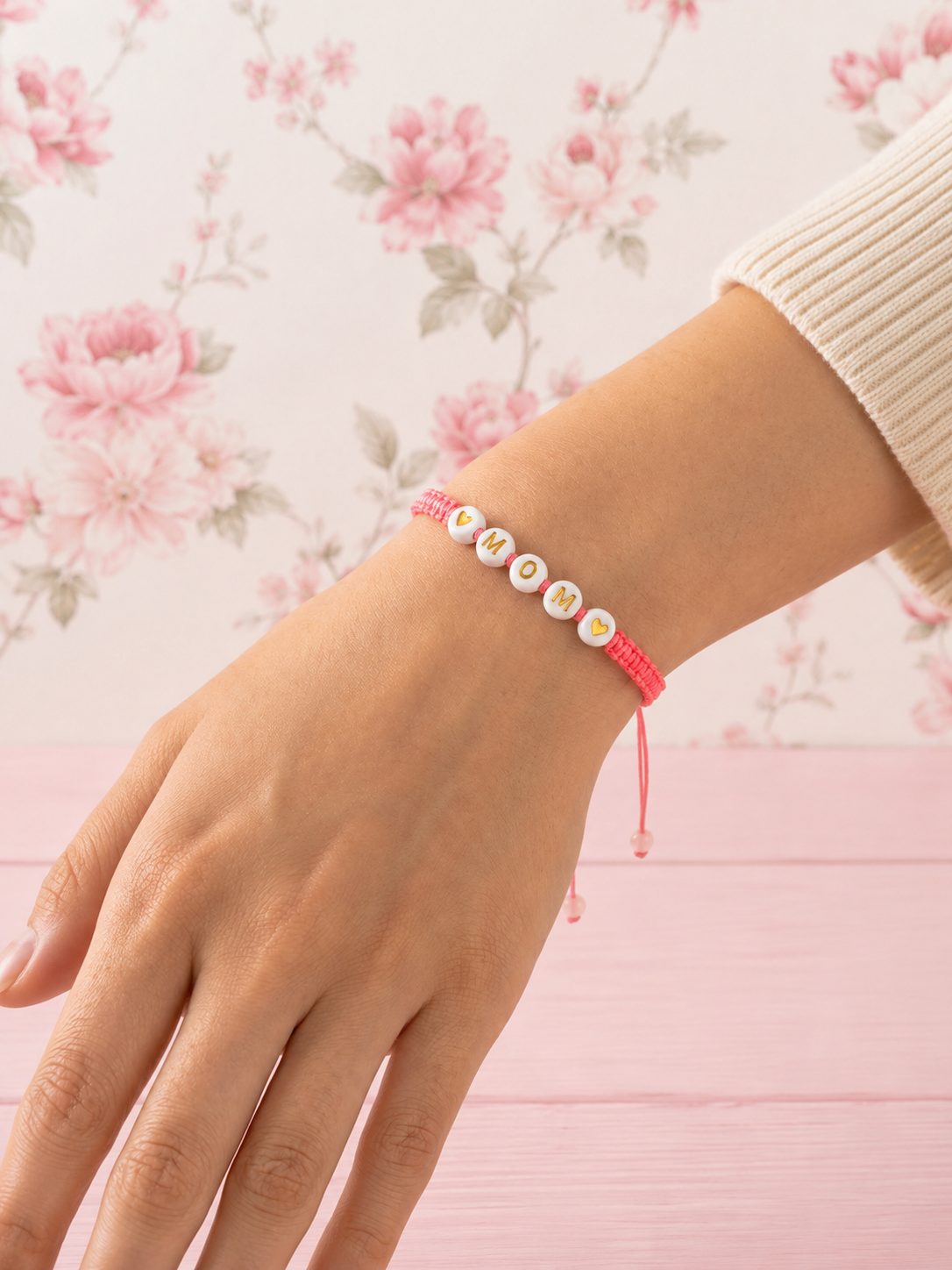 Pulsera Amor de Mamá en macramé rosado